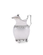 A PORTUGUESE SILVER COLOURED OBLONG BALUSTER JUG