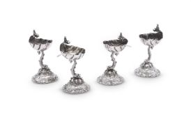 A SET OF FOUR CONTINENTAL SILVER COLOURED SALTS