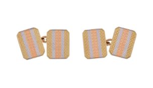 A PAIR OF EARLY 20TH CENTURY THREE COLOUR GOLD CUFFLINKS