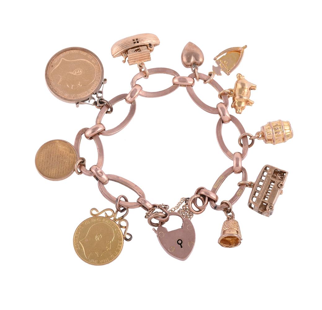 A GOLD COLOURED CHARM BRACELET