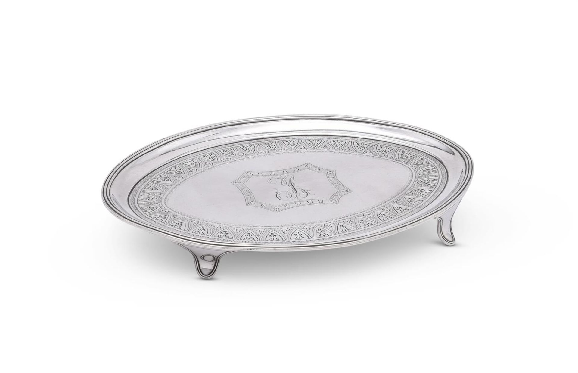 A GEORGE III SILVER OVAL TEA POT STAND