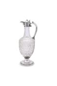 A RUSSIAN SILVER COLOURED MOUNTED WINE DECANTER