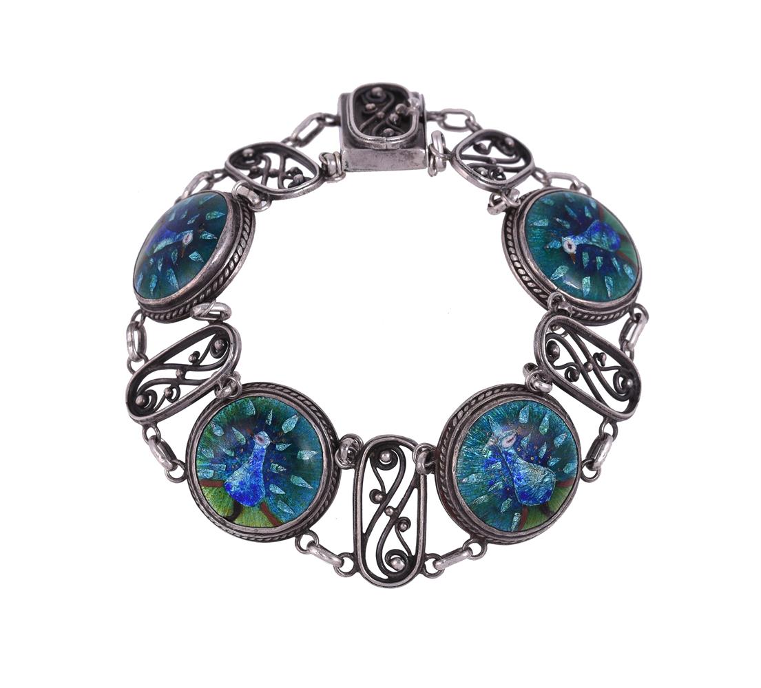 AN ARTS AND CRAFTS ENAMELLED PEACOCK BRACELET, CIRCA 1900