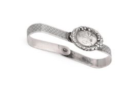A CONTINENTAL SILVER COMBINATION NAPKIN RING AND CLIP