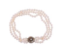 A THREE ROW CULTURED PEARL NECKLACE TO A SAPPHIRE AND CULTURED PEARL CLASP