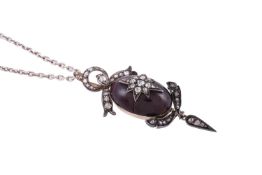 AN EARLY 20TH CENTURY GARNET AND DIAMOND DROP PENDANT