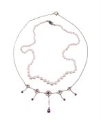 AN EARLY 20TH CENTURY SILVER GILT GARNET NECKLACE, CIRCA 1910