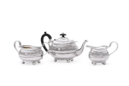 A SILVER OBLONG BALUSTER THREE PIECE TEA SET