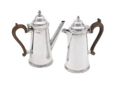 A PAIR OF SILVER CAFE AU LAIT POTS