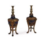 A PAIR OF CARVED GILTWOOD, PAINTED AND GILT METAL MOUNTED PEDESTAL URNS, IN GEORGE III STYLE