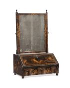 A QUEEN ANNE BLACK LACQUER AND GILT JAPANNED DRESSING MIRROR, CIRCA 1710