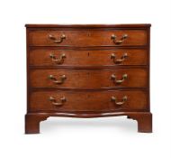 A GEORGE III MAHOGANY SERPENTINE FRONTED COMMODE IN THE MANNER OF THOMAS CHIPPENDALE, CIRCA 1770
