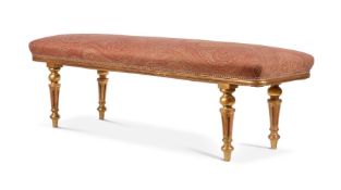 A VICTORIAN GILTWOOD AND UPHOLSTERED LONG STOOL, CIRCA 1870