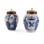 TWO SIMILAR DUTCH DELFT TOBACCO JARS AND TWO GILT METAL COVERS, LATE 18TH OR EARLY 19TH CENTURY