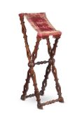 AN ITALIAN WALNUT AND VELVET MOUNTED LECTERN OR STAND, 16TH/17TH CENTURY