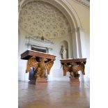 A PAIR OF GEORGE II CARVED PINE EAGLE CONSOLE TABLES, IN THE MANNER OF FRANCIS BRODIE, CIRCA 1740