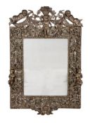 A WILLIAM & MARY CARVED AND SILVERED WALL MIRROR, CIRCA 1690
