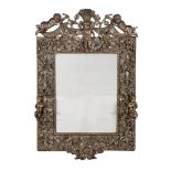 A WILLIAM & MARY CARVED AND SILVERED WALL MIRROR, CIRCA 1690