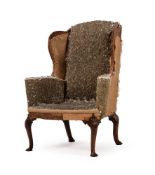 A WALNUT WING ARMCHAIR, CIRCA 1740 AND LATER