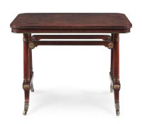 Y A REGENCY ROSEWOOD AND GILT METAL MOUNTED LIBRARY TABLE, IN THE MANNER OF MORGAN AND SANDERS