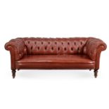 A VICTORIAN WALNUT AND BUTTONED RED LEATHER UPHOLSTERED 'CHESTERFIELD' SOFA, CIRCA 1870