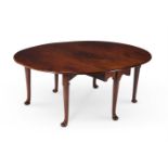 A GEORGE II MAHOGANY OVAL DROP LEAF TABLE, CIRCA 1750