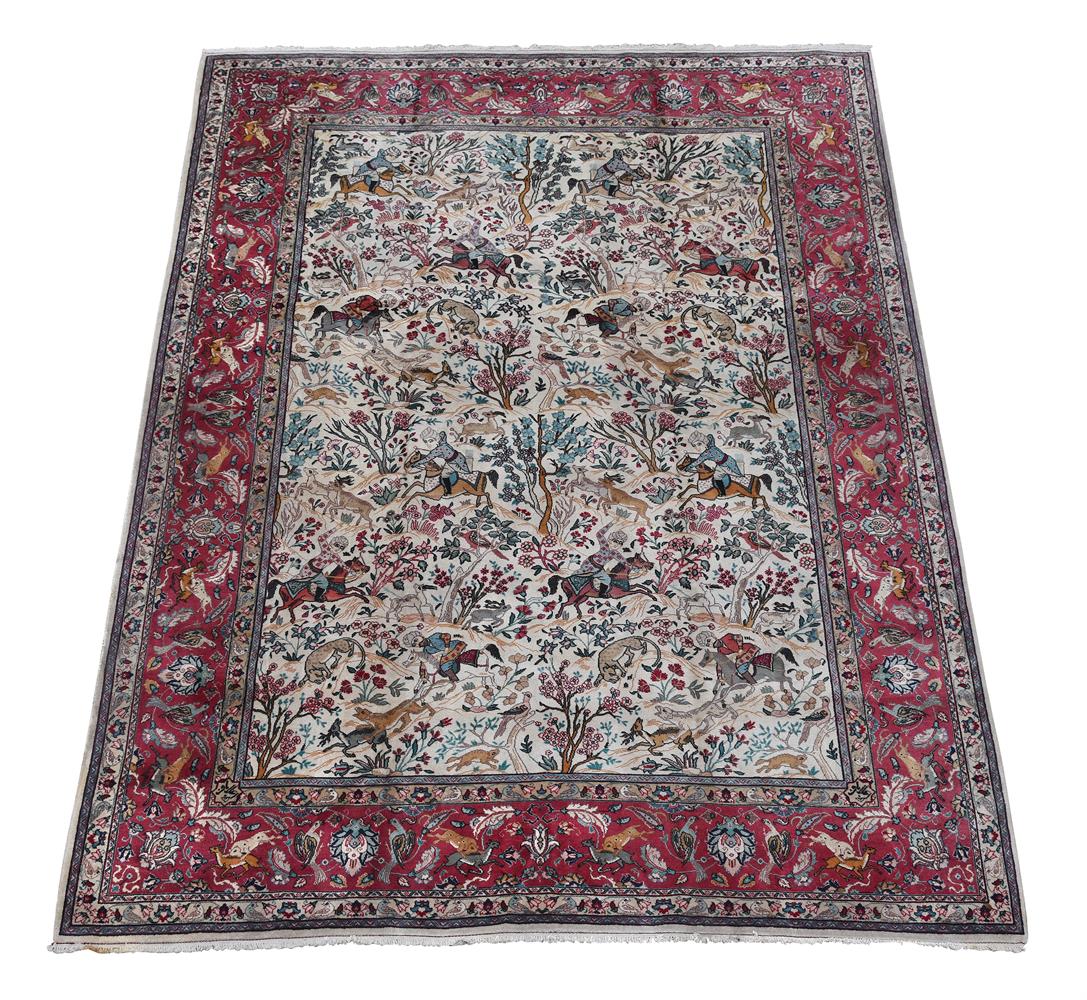 A TABRIZ CARPET, SIGNED BY MASTER WEAVER ALLABAF, approximately 402 x 296cm