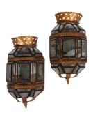 A PAIR OF CONTINENTAL EBONISED AND GILDED TOLE WALL LANTERN LIGHTS, PROBABLY EARLY 20TH CENTURY