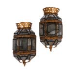 A PAIR OF CONTINENTAL EBONISED AND GILDED TOLE WALL LANTERN LIGHTS, PROBABLY EARLY 20TH CENTURY