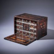 Y AN ITALIAN EXOTIC COCUS WOOD AND IVORY INLAID TABLE TOP CABINET, MILANESE, CIRCA 1660