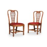 AN UNUSUAL PAIR OF GEORGE III FRUITWOOD CHAIRS, CIRCA 1800