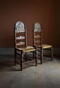 A MATCHED PAIR OF CONTINENTAL RED PAINTED AND SILVERED CHAIRS PROABLY SPANISH OR SOUTHERN ITALIAN