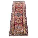 A NORTH WEST PERSIAN RUNNER, approximately 253 x 85cm