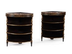 A PAIR OF PAINTED AND PARCEL GILT BOWFRONT CORNER CUPBOARDS ,IN REGENCY STYLE