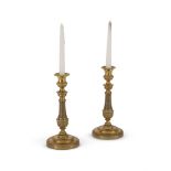 A PAIR OF FRENCH BRASS CANDLESTICKS, IN THE EMPIRE MANNER, LATE 19TH CENTURY