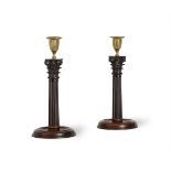 A PAIR OF GEORGE III MAHOGANY CANDLESTICKS, PROBABLY SCOTTISH, CIRCA 1780