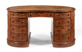 A VICTORIAN BURR WALNUT KIDNEY SHAPED PEDESTAL DESK IN THE MANNER OF HOLLAND & SONS