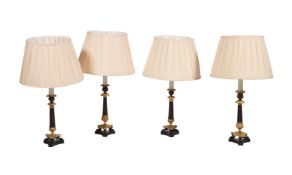 A SET OF FOUR FRENCH BRONZE AND GILT METAL TABLE LAMPS, IN EMPIRE STYLE, 20TH CENTURY