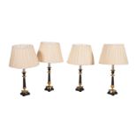 A SET OF FOUR FRENCH BRONZE AND GILT METAL TABLE LAMPS, IN EMPIRE STYLE, 20TH CENTURY