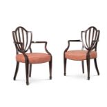 A PAIR OF GEORGE III MAHOGANY ARMCHAIRS, CIRCA 1790