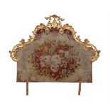 A CONTINENTAL CARVED GILTWOOD AND AUBUSSON NEEDLEWORK INSET BED HEAD, LATE 18TH/19TH CENTURY
