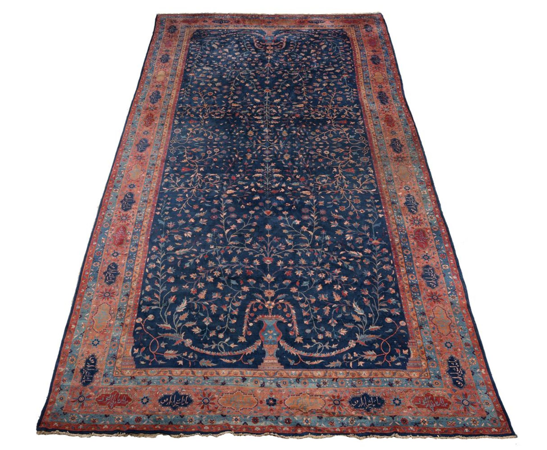 A TABRIZ CARPET, approximately 585 x 297cm