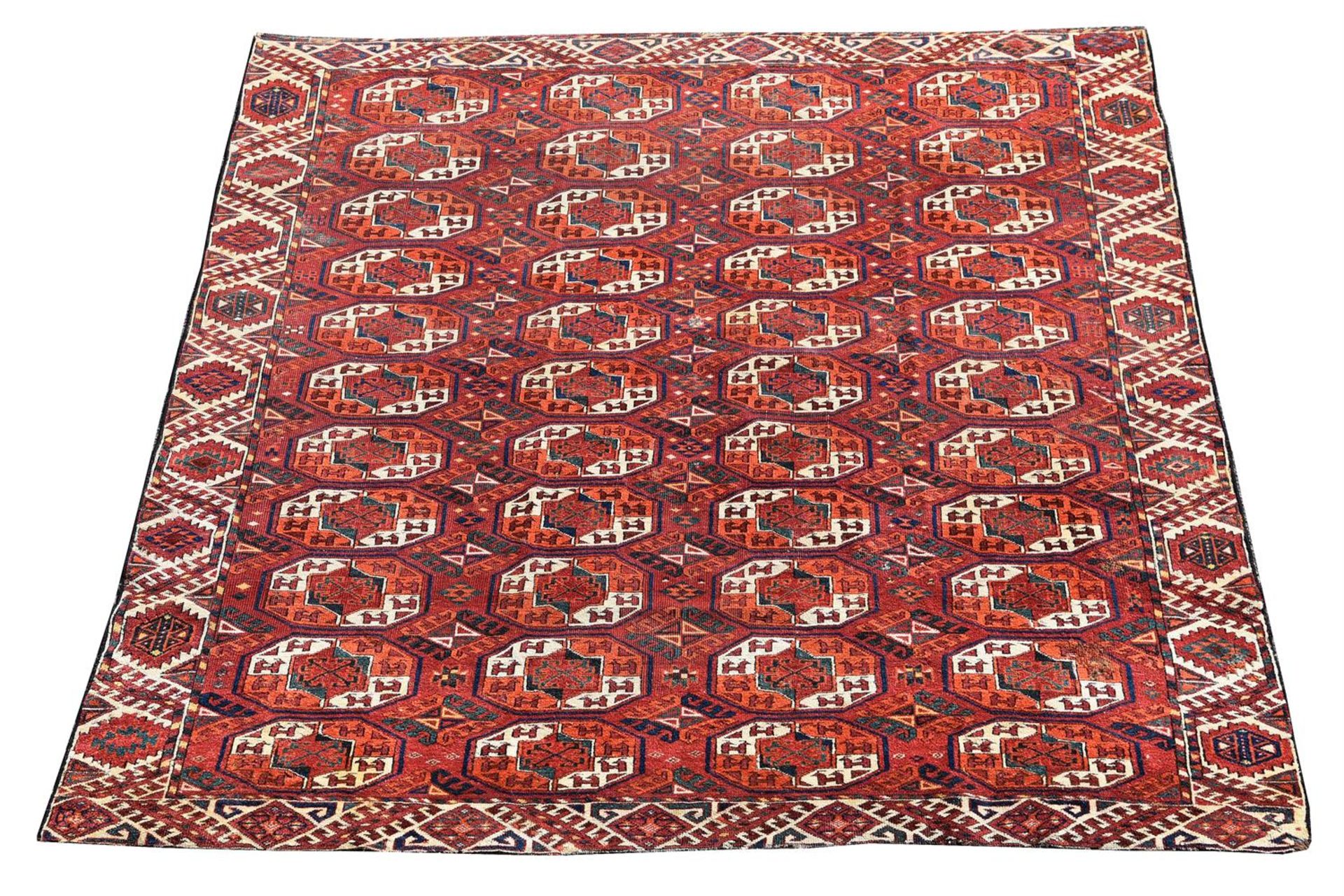 A TURKOMAN RUG, of unusual square format, approximately 205 x 196cm