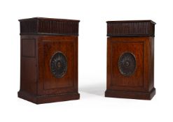 A PAIR OF GEORGE III MAHOGANY AND PARCEL GILT PEDESTAL CUPBOARDS, LATE 18TH CENTURY