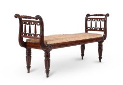 A REGENCY MAHOGANY WINDOW SEAT, IN THE MANNER OF GILLOWS, CIRCA 1820