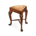 AN UNUSUAL GEORGE I WALNUT TRIANGULAR STOOL, CIRCA 1720