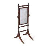 A REGENCY MAHOGANY AND EBONISED CHILD'S CHEVAL MIRROR, CIRCA 1820