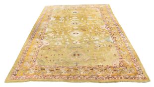 AN USHAK CARPET, approximately 545 x 392cm