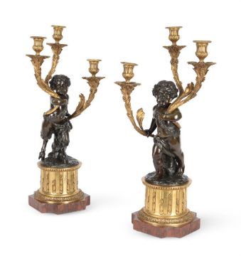 AFTER CLODION, A LARGE PAIR OF FRENCH BRONZE AND ORMOLU THREE LIGHT CANDELABRA