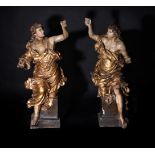 A LARGE PAIR OF FRANCO-ITALIAN CARVED, GILDED AND POLYCHROME ANGELS, MID 18TH CENTURY